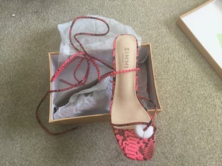 Pink snake sandals